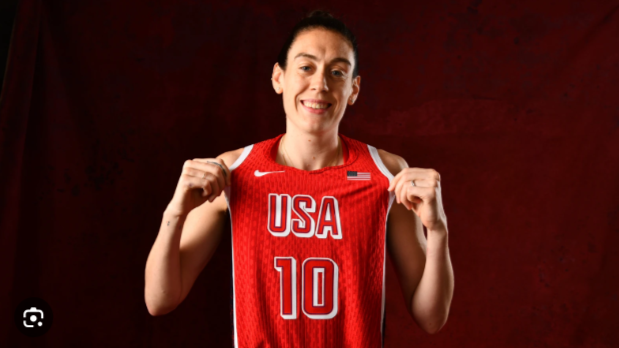 Breanna Stewart holding USA Basketball jersey #10