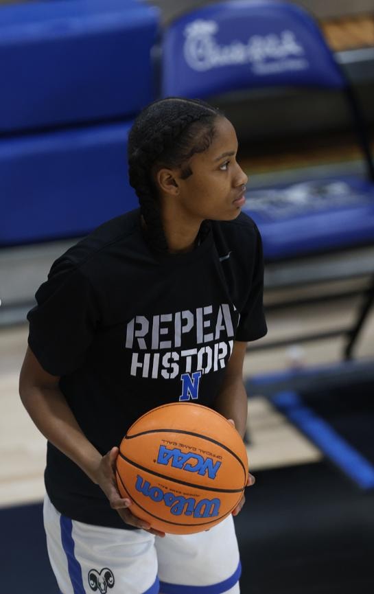 Jazmin Maddox on the court for Newton High School
