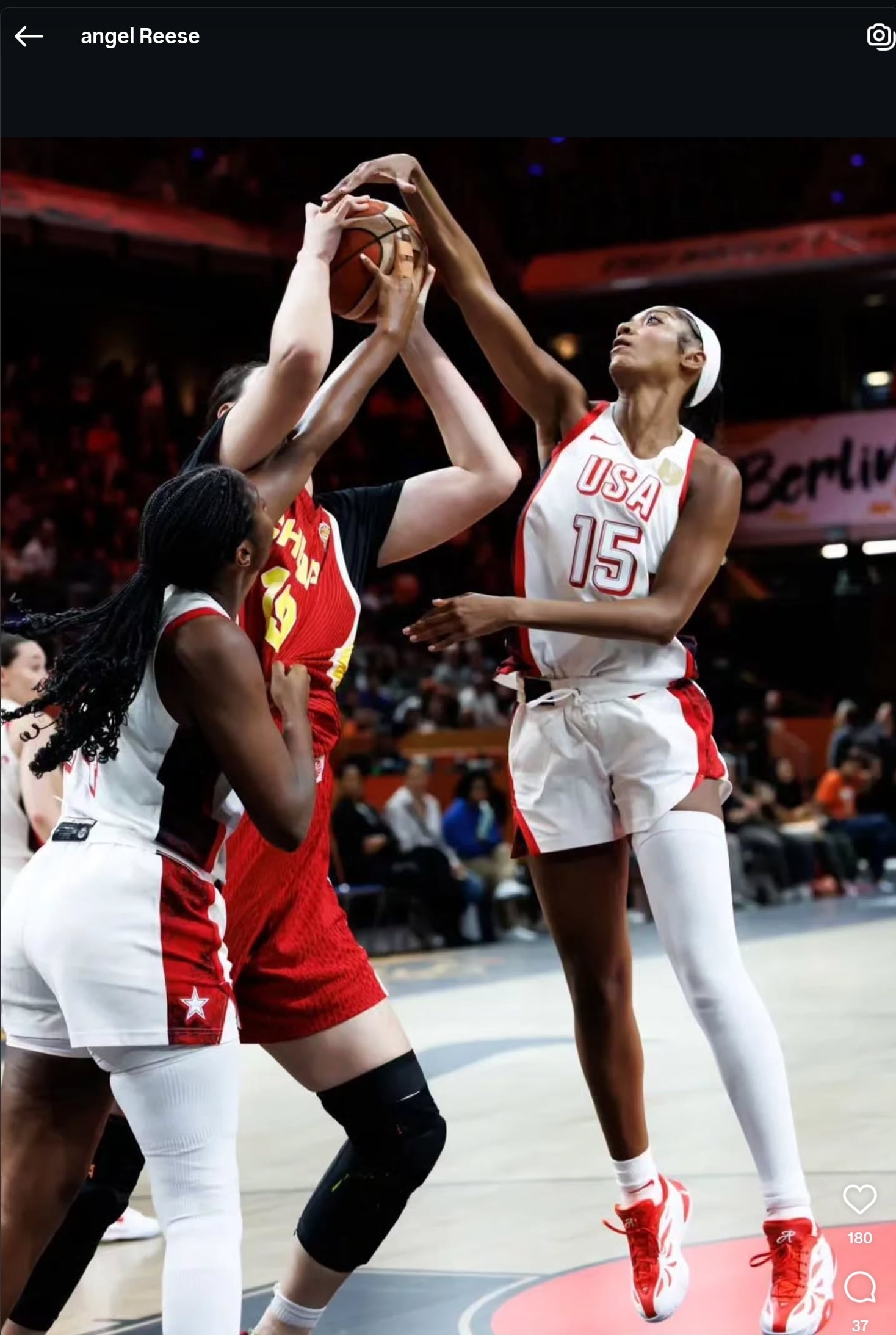 Angel Reese battling for a rebound in USA uniform at FIBA World Cup