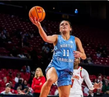 Kate Harpring shooting a layup for UNC against Maryland